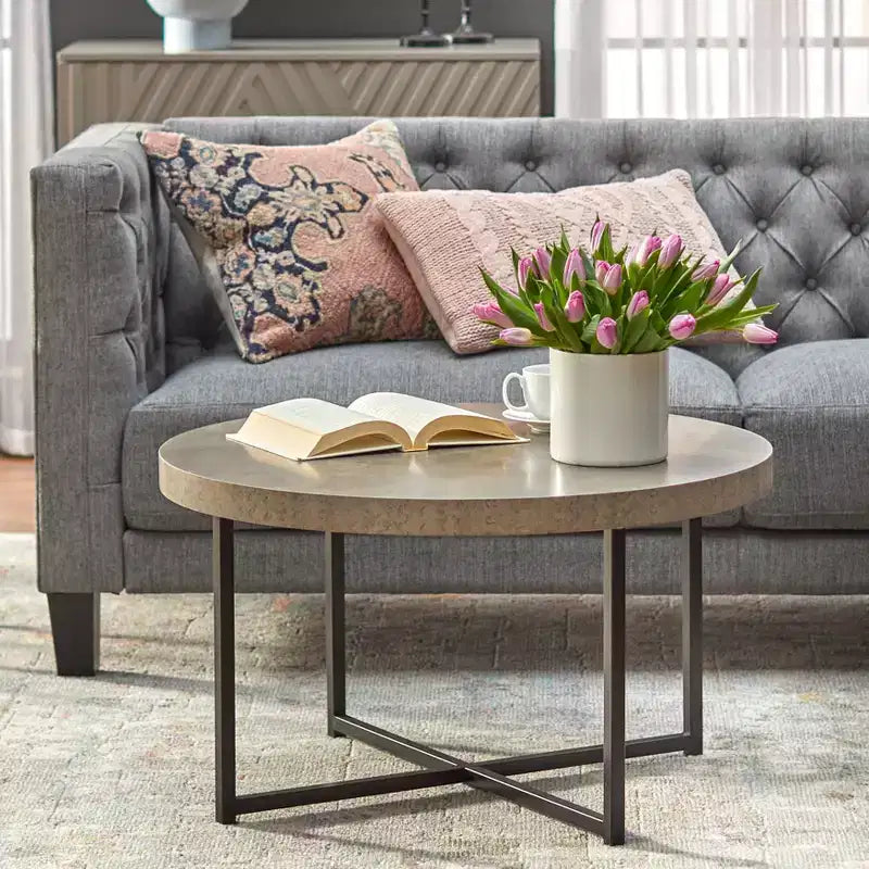 Table basse ronde grise et noire, piètement en métal, 1 personne